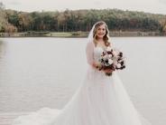 Bride on boathouse